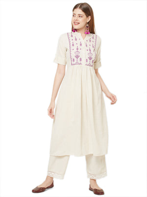 Sitayya Women's Bohemian Purple Embroidered Yoke A-line Off-White Kurta Dress | Main Image