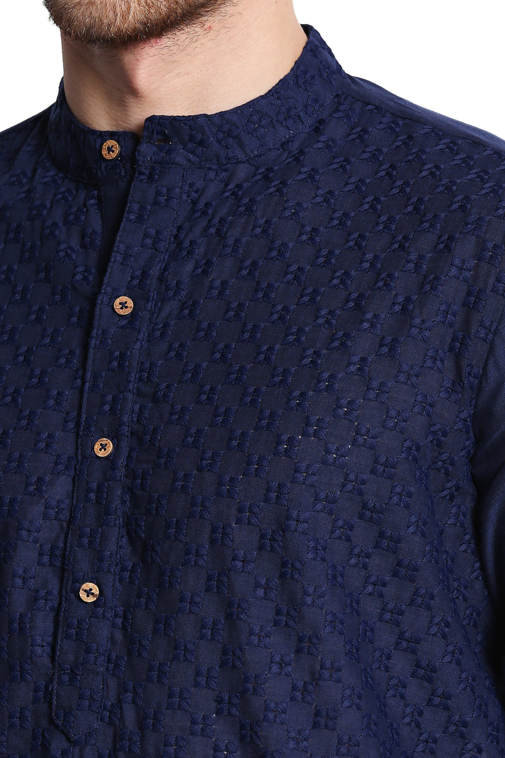 Navy blue In-Sattva kurta tunic with buttons on a person 