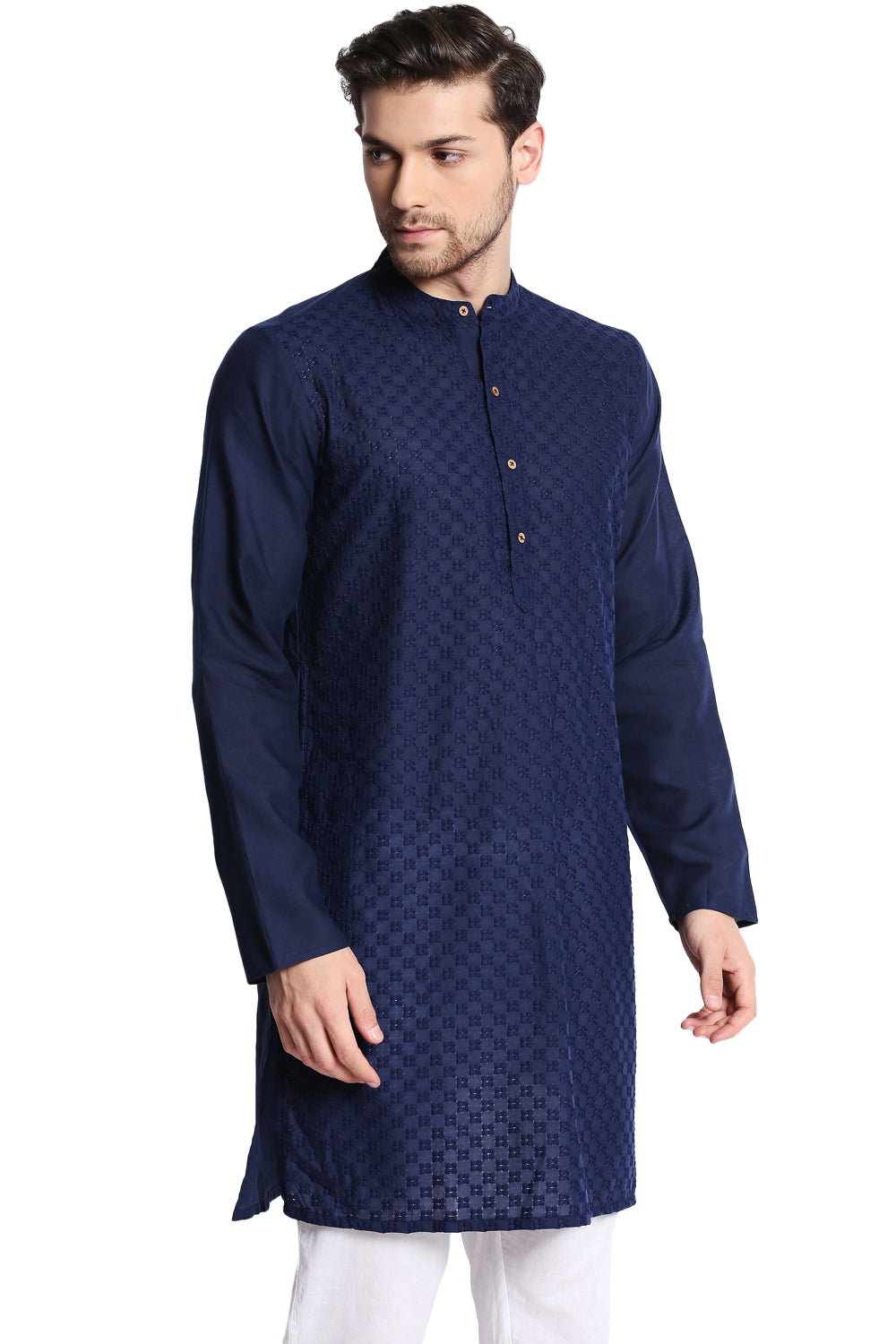 Man wearing a navy blue kurta with white pants