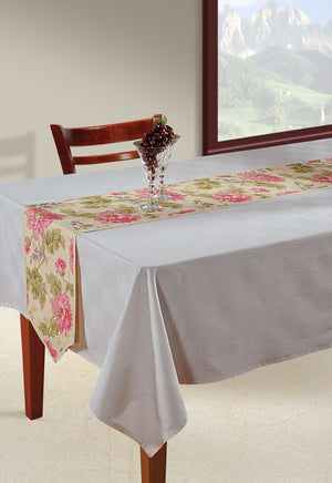 In-Sattva cream bohemian floral print table runner styled across a white dining table with a vase