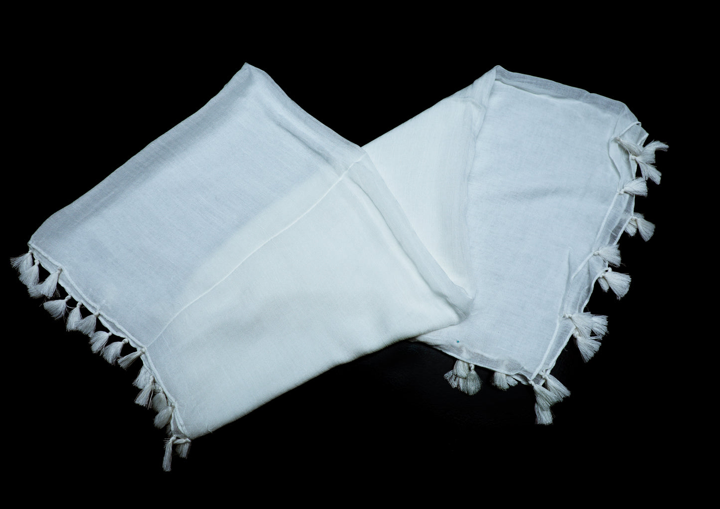 In-Sattva White solid color rayon scarf stole, additional product image highlighting its color and woven detailing.