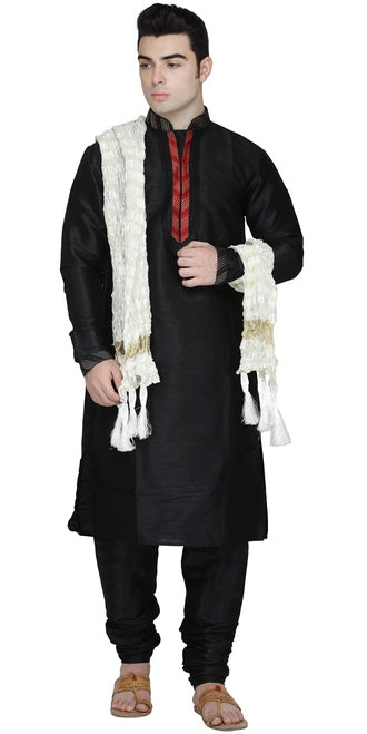 In-Sattva men's black cotton churidar pants styled with a kurta, showing the coordinated color and gathered ankle fit.