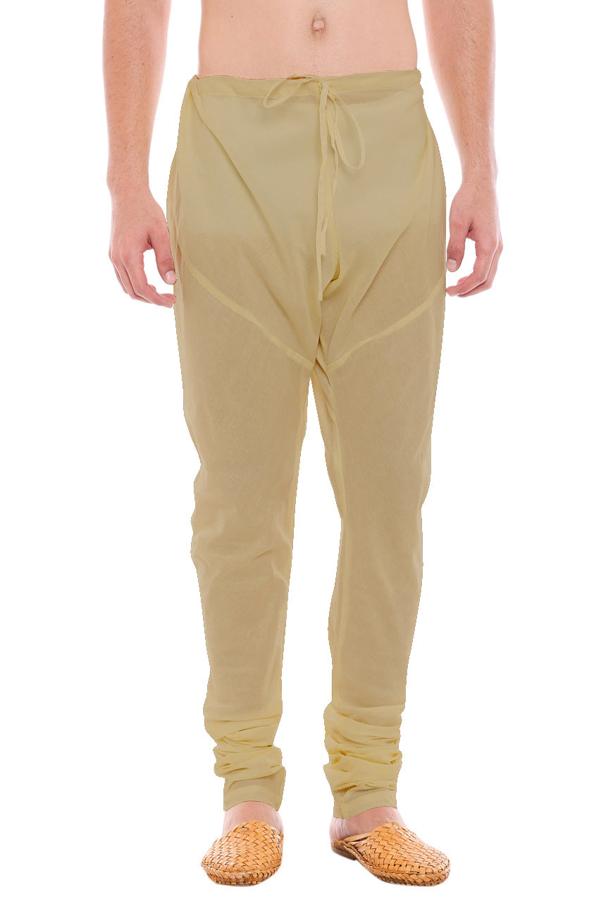 Front view of In-Sattva men's brown art silk churidar pants, showing the drawstring waist, tapered legs and ankle gathers.