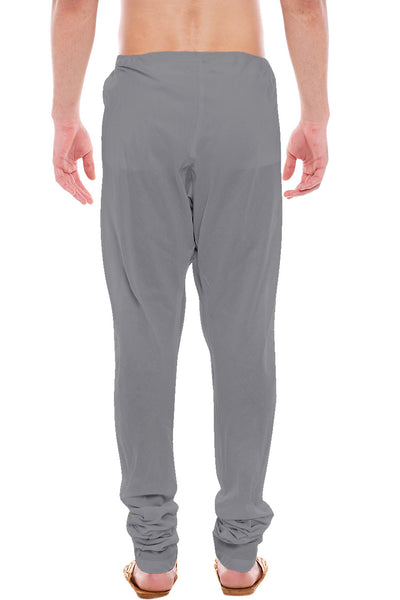 Back view of In-Sattva men's gray art silk churidar pants, showing the tapered full-length fit and ankle gathers from the back.