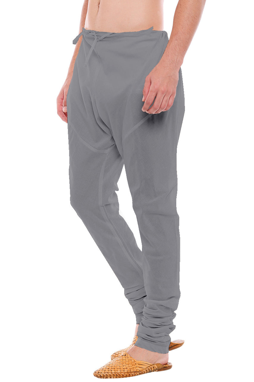 Right profile view of In-Sattva men's gray art silk churidar pants, showing the smooth art silk sheen and gathered ankle fit.