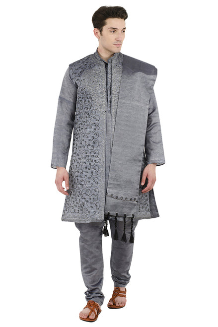 In-Sattva men's gray art silk churidar pants styled with a kurta, showing the coordinated color and gathered ankle fit.