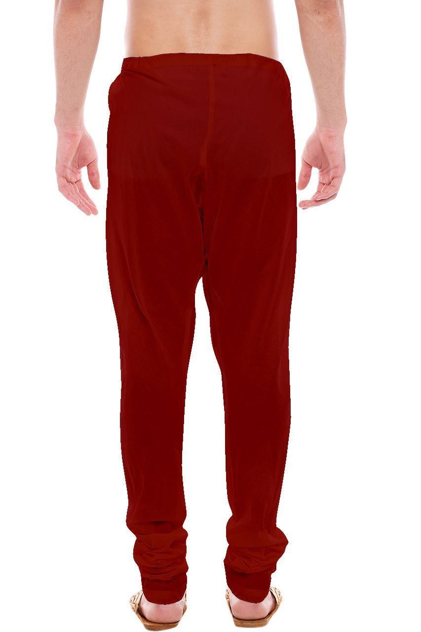 Back view of In-Sattva men's red art silk churidar pants, showing the tapered full-length fit and ankle gathers from the back.