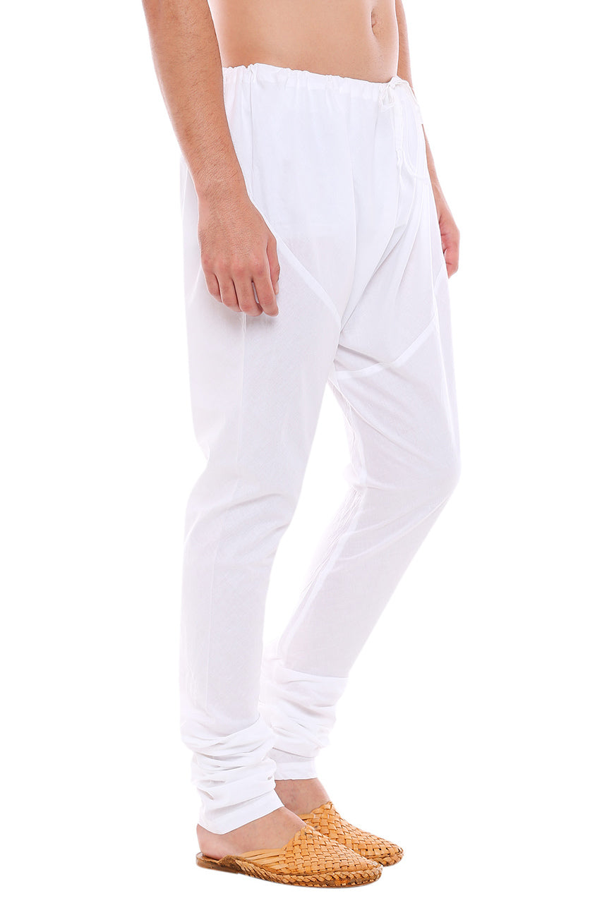 Left profile view of In-Sattva men's white cotton churidar pants, showing the smooth cotton profile and gathered ankle fit.