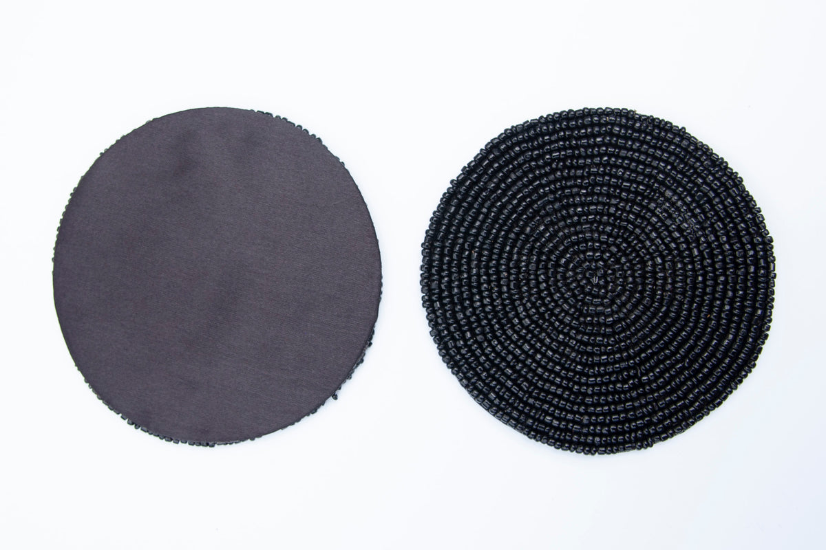 Front and non-slip back of a Rangeene black glass beaded round coaster