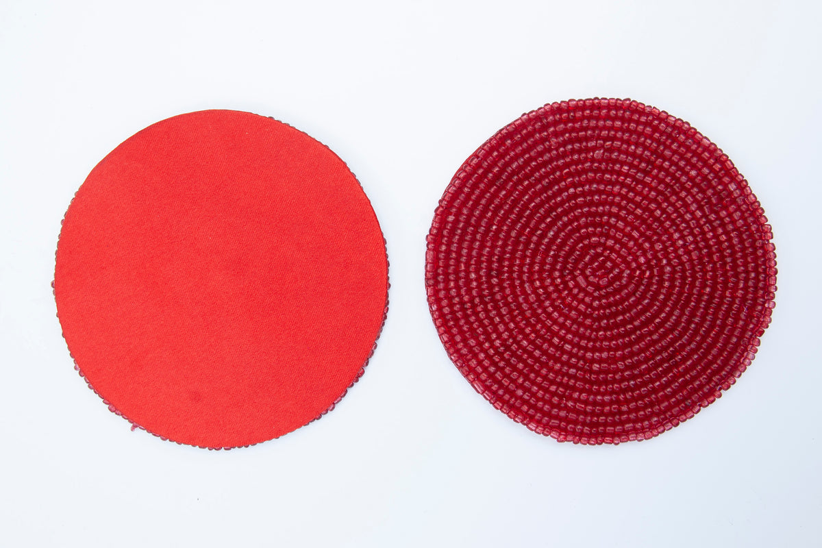 Front and non-slip back of a Rangeene red glass beaded round coaster