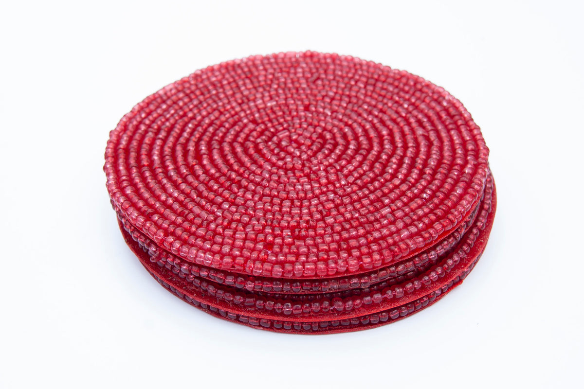 Stacked set of Rangeene red handmade glass beaded round coasters