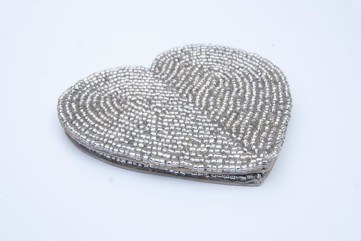 Stacked set of Rangeene silver handmade glass beaded heart shaped coasters