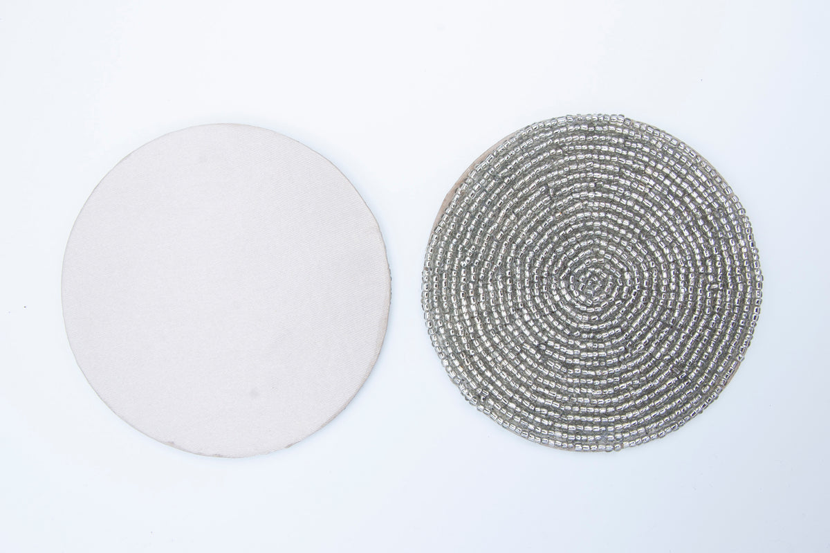 Front and non-slip back of a Rangeene silver glass beaded round coaster