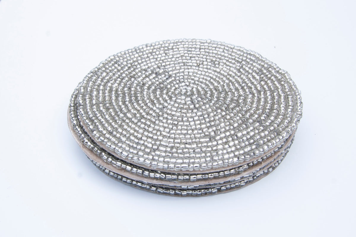 Stacked set of Rangeene silver handmade glass beaded round coasters