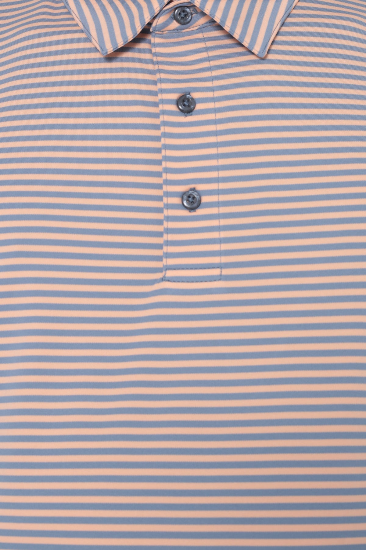 Collar and chest pocket detail on men's amber fine striped moisture-wicking golf polo