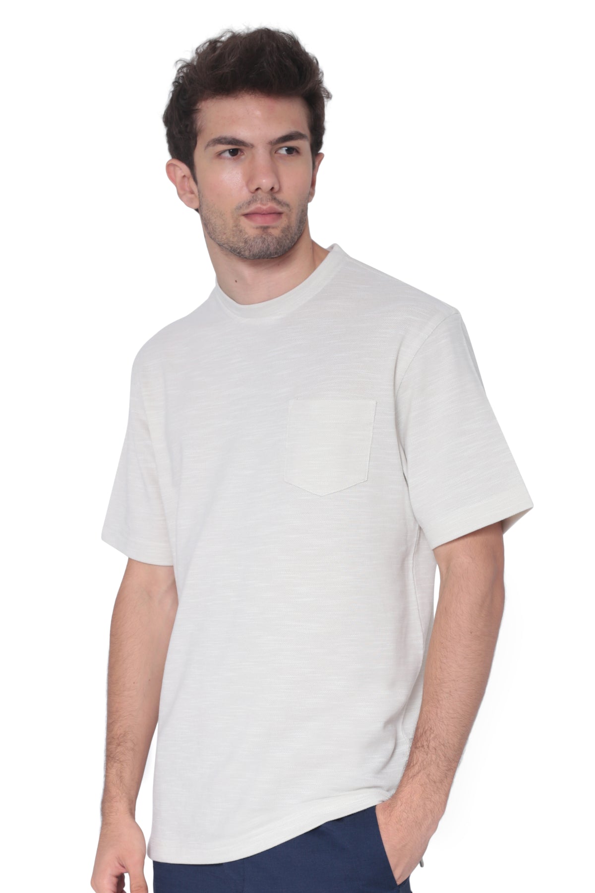 Left side profile of men's cream space-dyed performance pocket T-shirt for activewear and travel