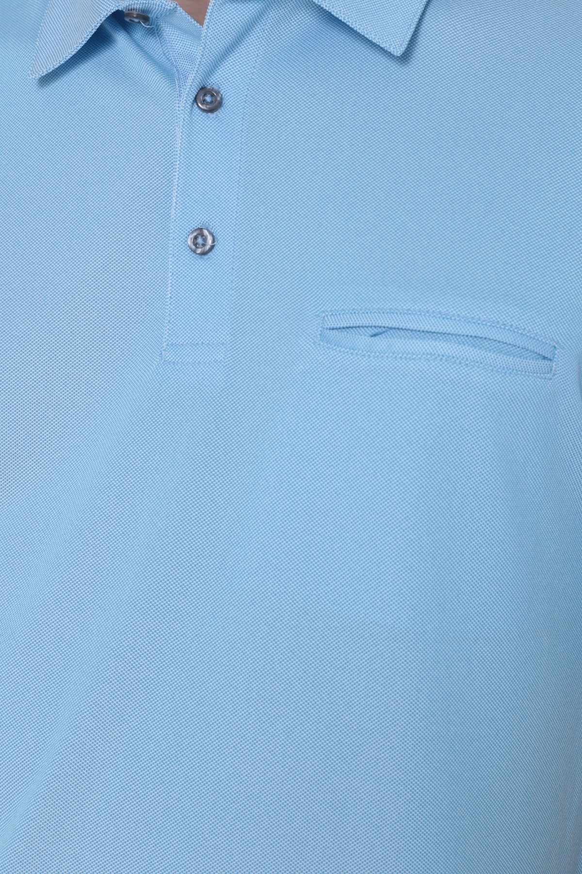 Collar and chest pocket detail on men's light blue quick-dry golf polo with chest pocket