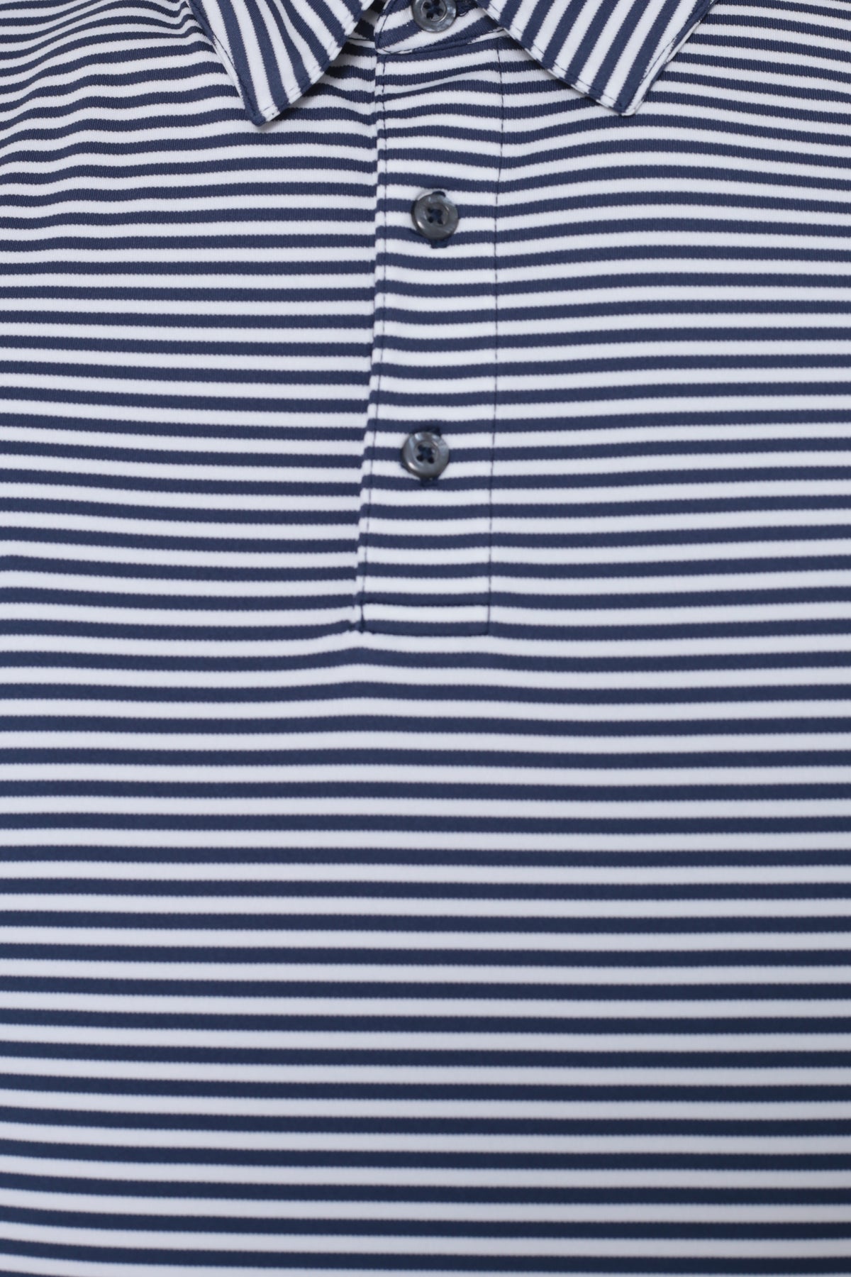 Collar and chest pocket detail on men's navy fine striped moisture-wicking golf polo