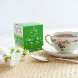 Akshar Ayurveda Balance Green Herbal Tea, 10 tea bags brewed tea product lifestyle image