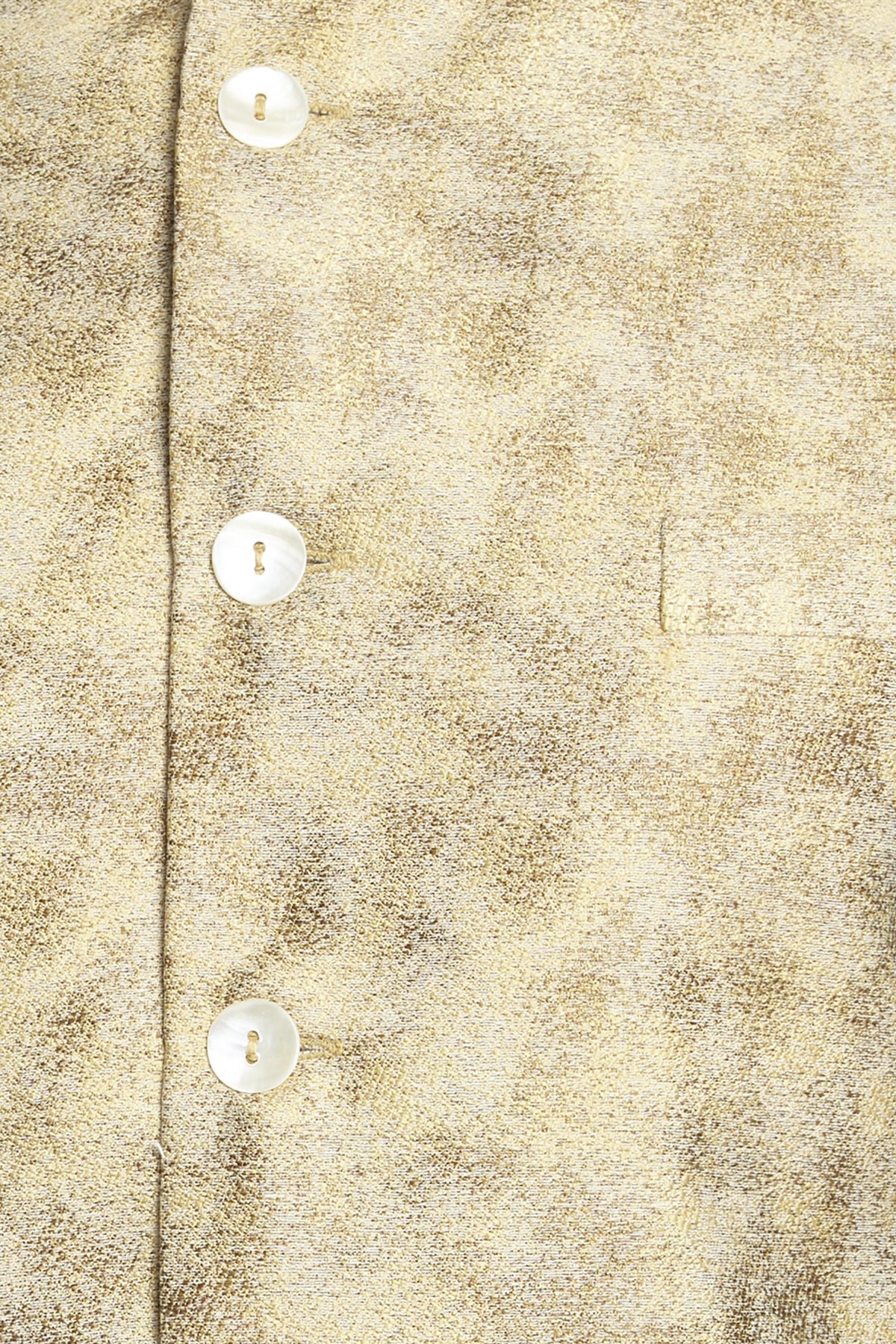 Abstract print and pocket close-up of men's abstract-print Nehru jacket vest, highlighting premium wedding and festival wear.