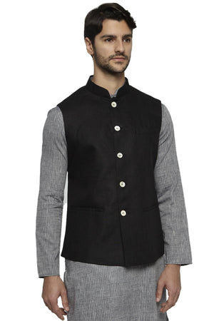 Front view of Ethnix men's black cotton-linen Nehru jacket vest, highlighting premium wedding guest style.