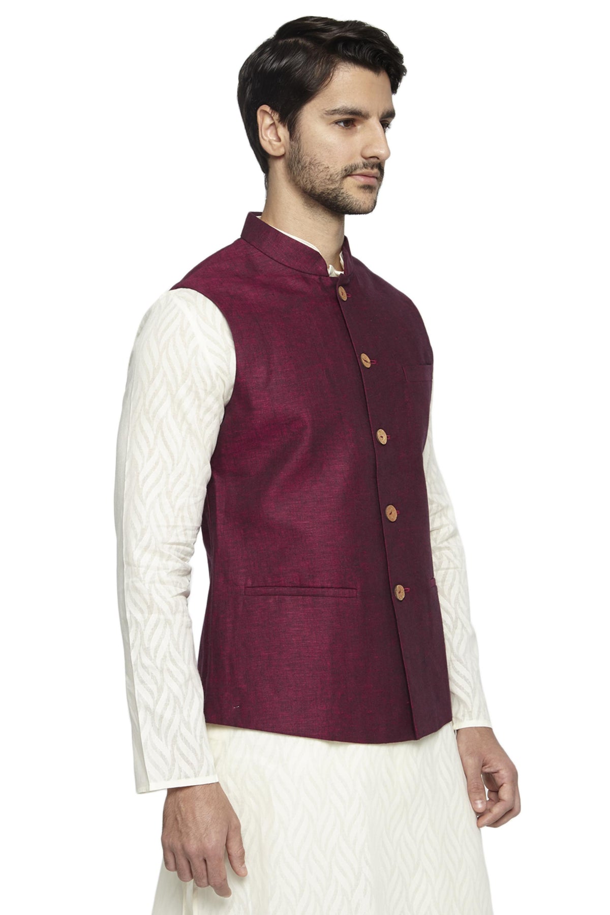 Side profile of men's maroon Nehru jacket vest, highlighting vibrant festive wedding guest style.