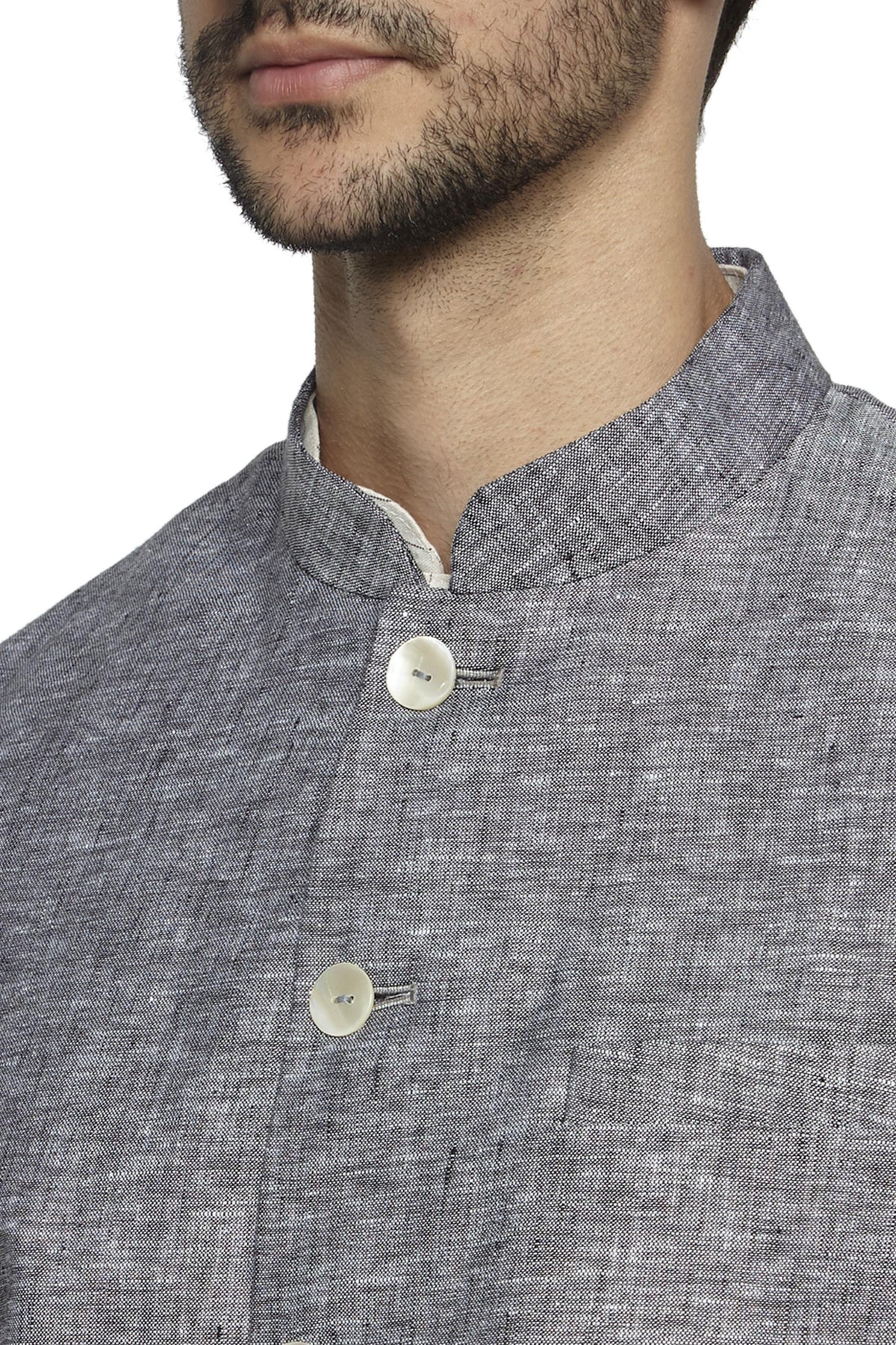 Front pocket close-up of men's steel gray Nehru jacket vest, highlighting refined wedding guest style.