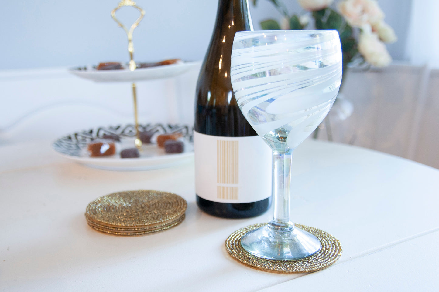 Rangeene Handmade Beaded Circle Gold Coaster with a Wine Glass on Top