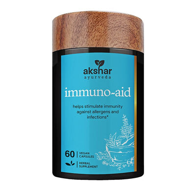 Front pack shot of Akshar Ayurveda Immuno Aid 500mg herbal supplement, 60 vegan tablets