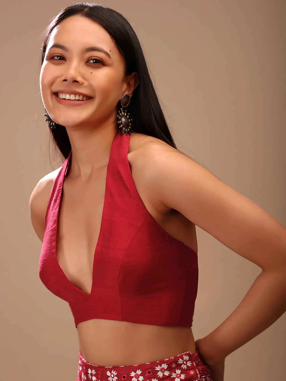 Primary product photograph of Blushing Red Silk Sleeveless V-Neck Blouse, showcasing its design, color and V neckline.