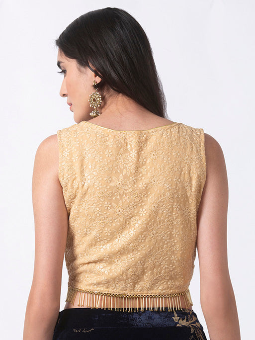 Alternate photograph of Ethnicity Beige Embroidered Crop Top Hemmed with Tassels, with attention to the overall cut and tassel hem.