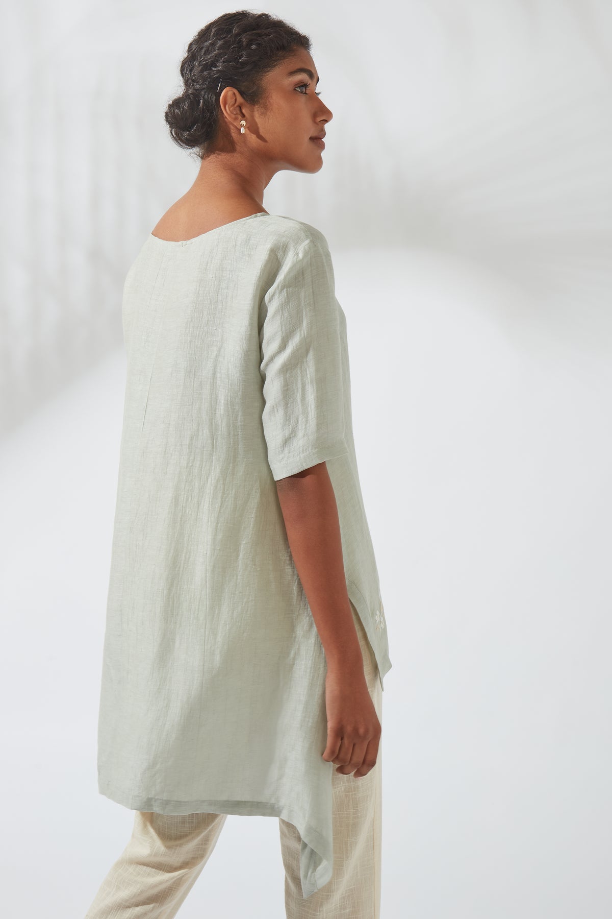 Alternate photograph of Bohemian Classic Silk Linen Gray Embroidered High-Low Top, with attention to the overall cut and embroidery.