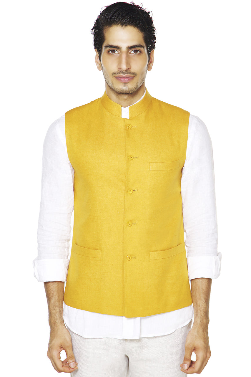 Front view of In-Sattva men's mustard Mandarin collar vest, highlighting vibrant festive wedding guest style.
