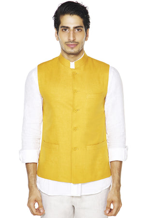 Front view of In-Sattva men's mustard Mandarin collar vest, highlighting vibrant festive wedding guest style.