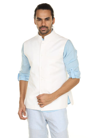 Front view of In-Sattva men's white Mandarin collar vest, highlighting clean, elegant daytime wedding guest style.
