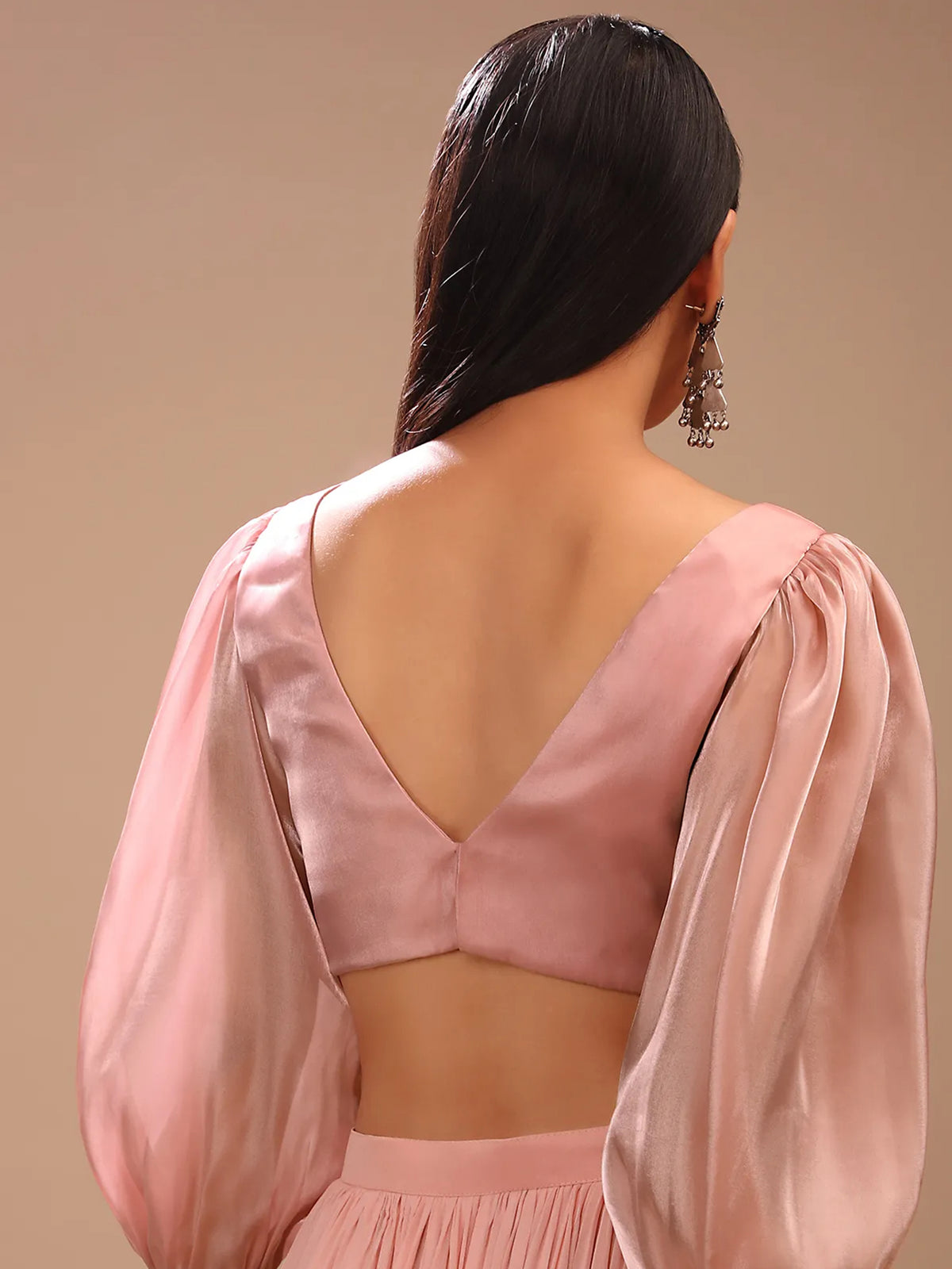 Further product photograph of Rouge Pink Satin Balloon Full Sleeve V-Neck Blouse, presenting the clothing design and V neckline.