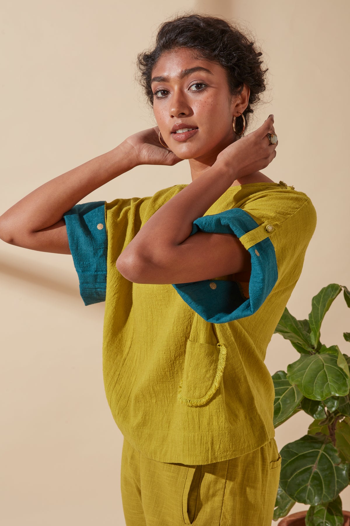 Side view of Women's Bohemian Classic 100% Cotton Mustard and Teal Box Top, showing the fit, cut and drape