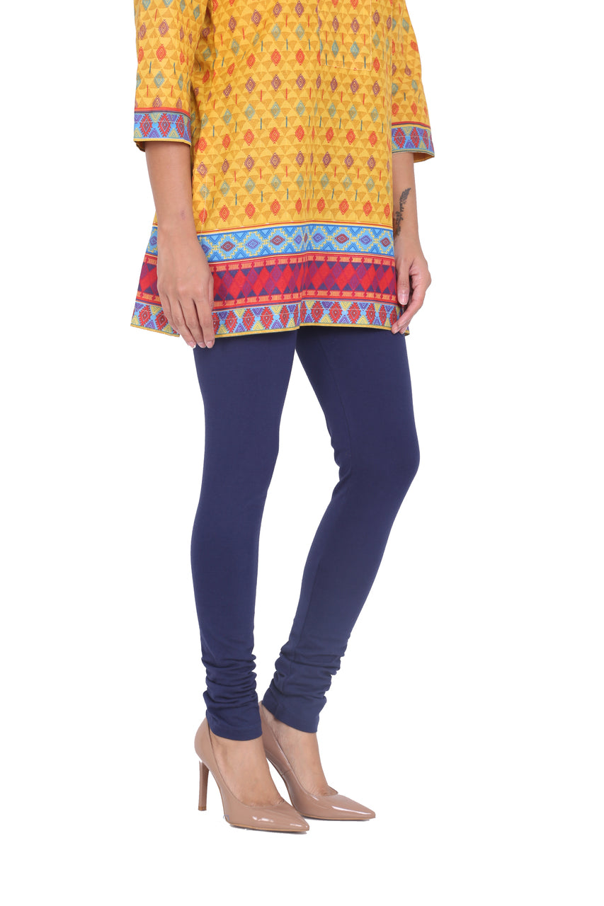 Alternate side-angle view of Solid Indigo Leggings, showing the garment shape from another perspective.