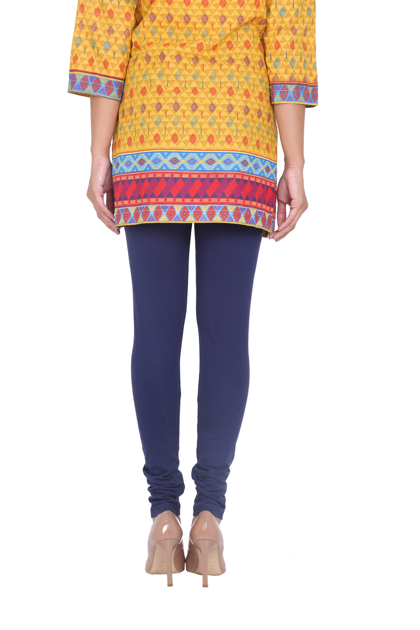Back view of Solid Indigo Leggings, showing the rear silhouette and garment finish.