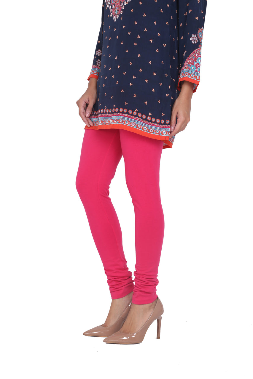 Side view of Solid Pink Leggings, showing the garment shape and drape.