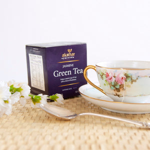 Akshar Ayurveda Jasmine Green Herbal Tea, 10 tea bags brewed tea product lifestyle image