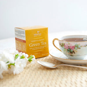 Akshar Ayurveda Lemon and Honey Herbal Tea, 10 tea bags brewed tea product lifestyle image