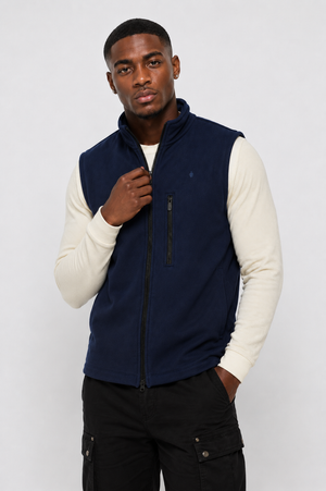 Full-length front view of Macho Genie men's blue softshell zip-up vest, highlighting weather-resistant outdoor wear.