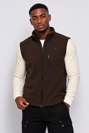 Front view of Macho Genie men's brown softshell zip-up vest, highlighting weather-resistant layering built to last.
