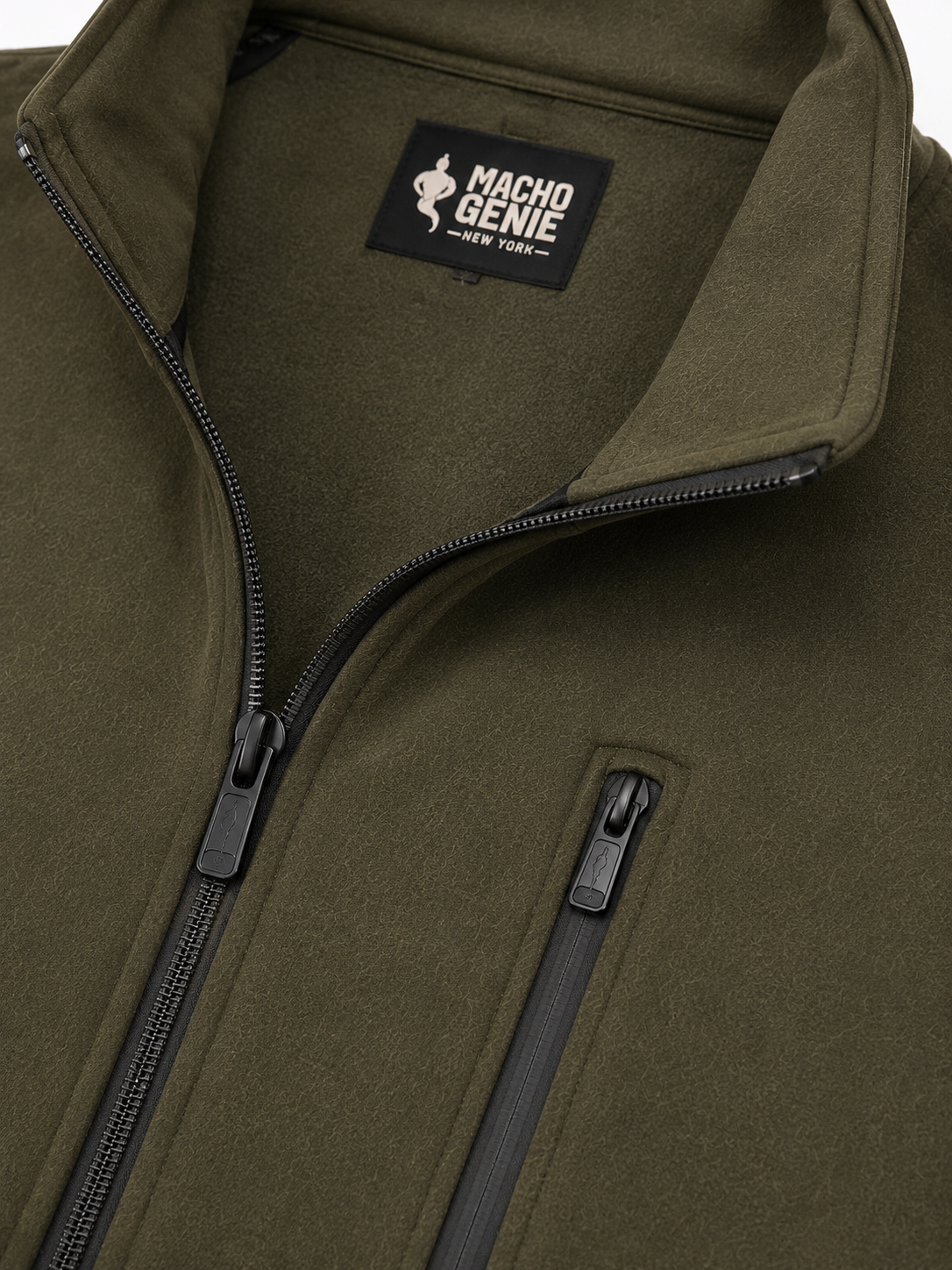 Zipper and pocket close-up of men's olive green softshell jacket, highlighting weather-resistant outdoor wear.