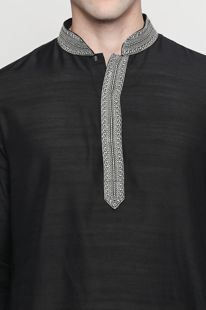 Men's black embroidered cotton blend knee-length kurta, side view.