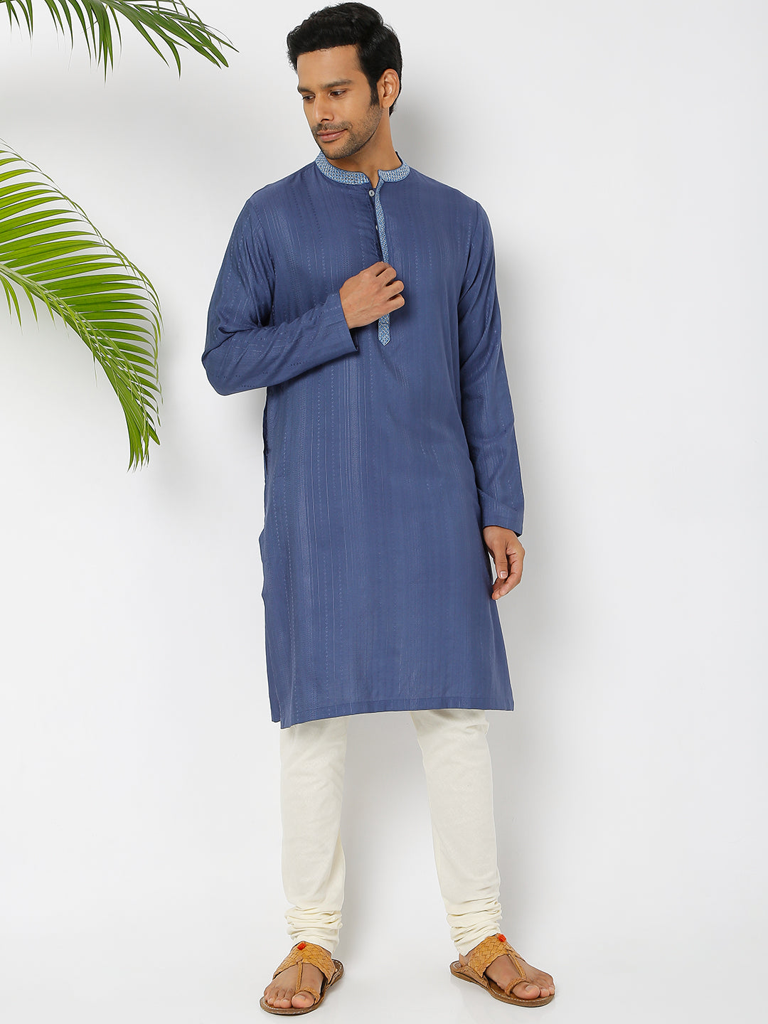 Men's blue embroidered cotton knee-length kurta, collar and neckline detail.