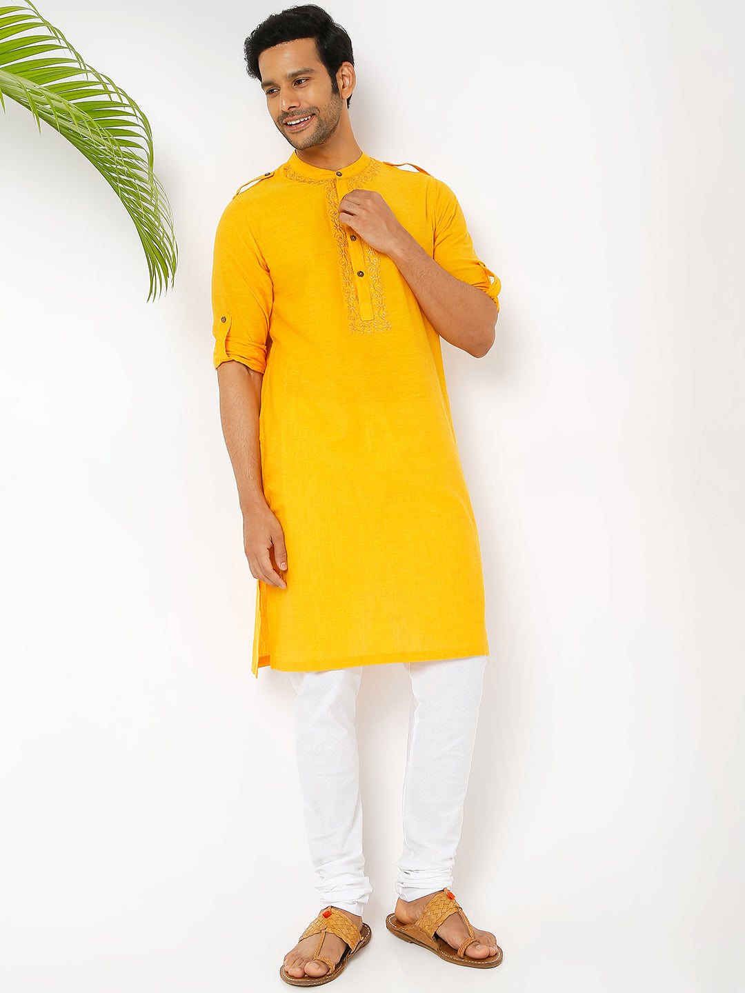 Men's golden yellow cotton knee-length kurta, collar and neckline detail.