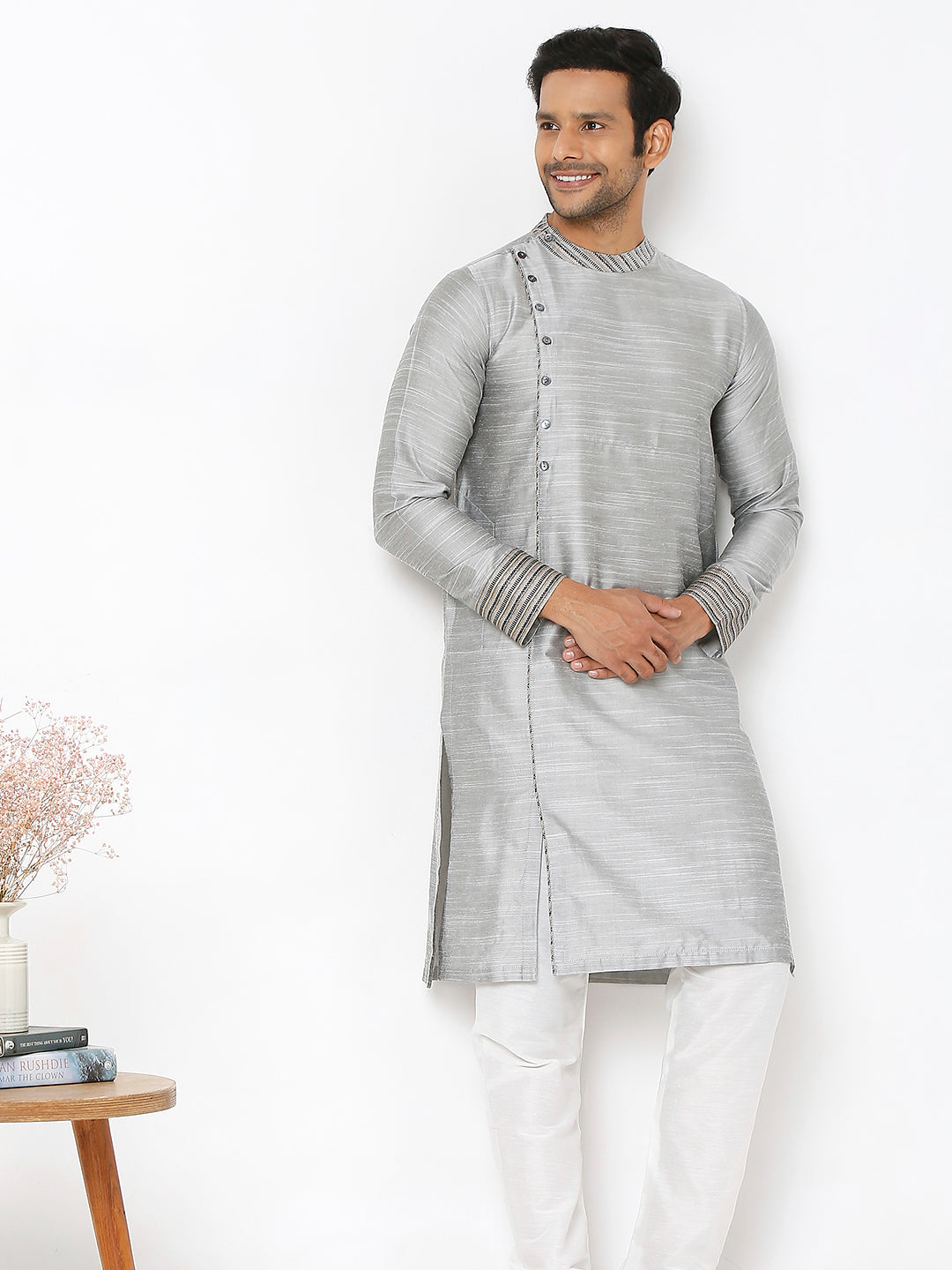 Men's grey cotton band collar knee-length kurta, fabric texture detail.