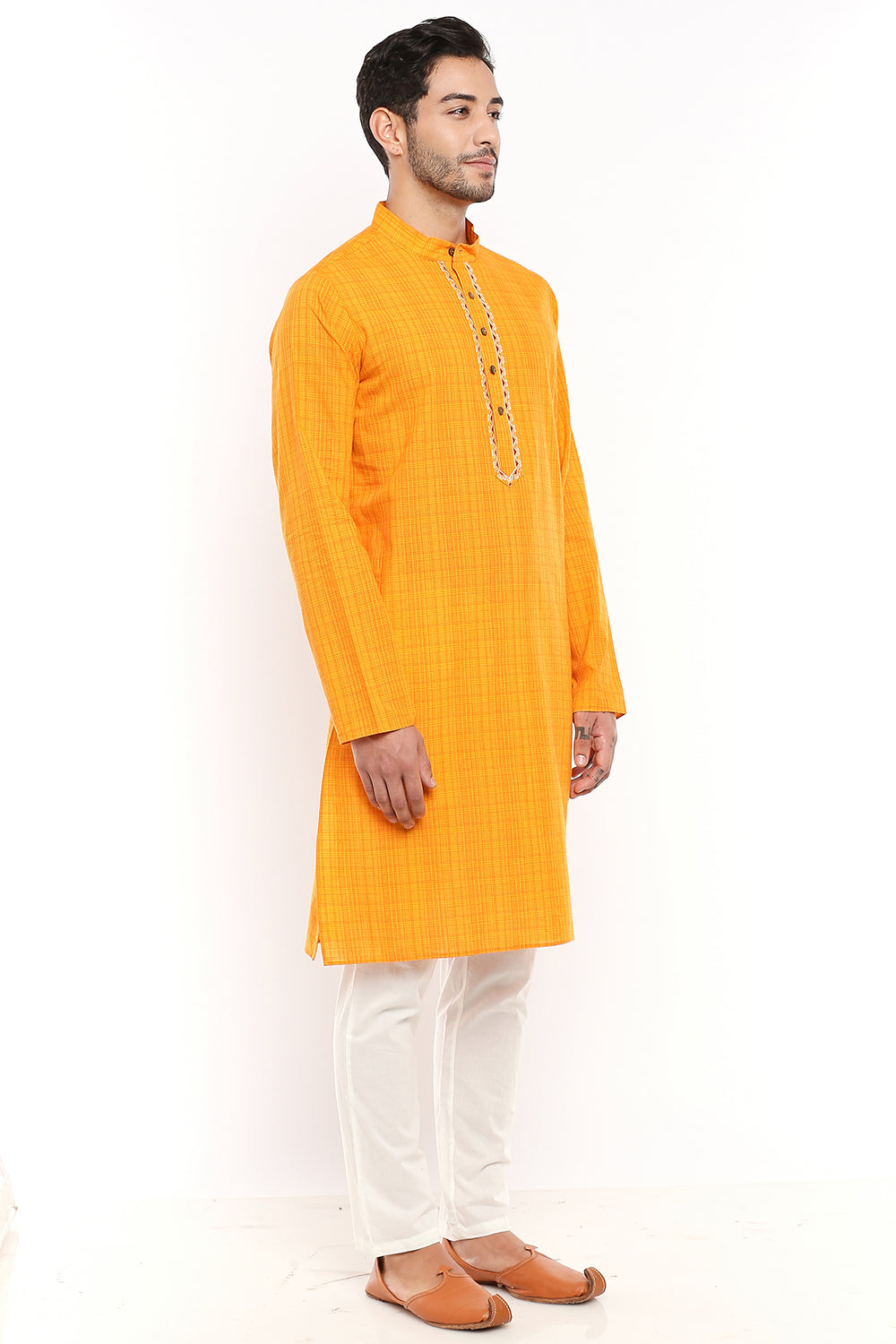 Men's hand-embroidered cotton knee-length kurta, side view.